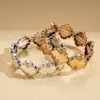 Pulsera Retro Europea y Americana con Estampado Geométrico Irregular Desgastado Cuerda Elástica Brillante Joyería de Nicho Transfronteriza de Alta Gama para Mujeres