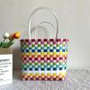 Bolso de playa tejido de verano nuevo regalo a mano cesta a mano cesta tejida a mano cesta de verduras bolso de mano para mujer bolso de mano al por mayor