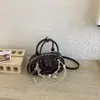Bolsa de Pão Nicho Estilo Coreano Tamanho Pequeno 2026 Novo Modelo de Primavera Bolsa de Ombro de Alto Valor Casual Transversal Bolsa de Mão