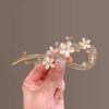 Outono e inverno Olho de gato flash Diamante luz luxo torção clipe Alto sentido Flor grampo de cabelo para trás cabeça moda online acessórios para cabelo vermelho atacado