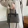 La popular bolsa de mensajero para mujer de este año 2023, nuevo bolso de mano informal estilo western, bolso de cubo de un solo hombro estilo coreano de nicho