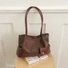 Bolso tejido de estilo ins transfronterizo para mujer, bolso de mano tote de gran capacidad 2026, bolso tipo cubo moderno y sencillo