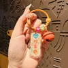 Creativo y Hermoso Significado Etiqueta Pequeña Llavero de Coche Dibujos Animados Colgante para Mochila Escolar Sanación Pareja Pequeño Regalo Venta al por Mayor