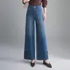 Pantalones vaqueros cropped de diseño de retazos bordados de moda estilo chino, nuevos pantalones de pierna ancha fluidos de tendencia Otoño 2026