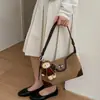 Bolso de hombro de moda vintage de alta calidad, bolso para el antebrazo para mujer, nuevo bolso cruzado simple versátil de gamuza 2026