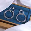 Nuevos pendientes de moda exagerados 2024 círculo hueco pendientes largos diseño de nicho femenino pendientes de personalidad de alta gama