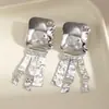 Pendientes Metálicos Exagerados de Forma Irregular de Gota de Agua Europeos y Americanos para Mujer Pendiente de Flor de Ola de Industria Pesada de Nicho Accesorio de Concha de Pulpo Venta al por Mayor