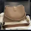 Bolsa de Ombro Simples Nova Moda Verão 2026 Estilosa Versátil para o Dia a Dia Feminina Bolsa Transversal Casual Tendência
