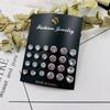 Europa y Estados Unidos temperamento simple comercio exterior Amazon AliExpress aretes de circonita con garra aretes aretes traje de 12 aretes de diamantes