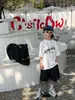 TaiRu 2026 Verano Nuevo Estilo Coreano Lavado Estampado de Letras Manga Corta Moda Infantil Casual Camiseta para Niños