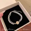 Pulseira de pérola com estrela de zircônia estilo vintage francês, requintada e elegante, versátil, luxo leve, toque de alta qualidade, joia feminina