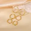 Pendientes de Otoño e Invierno 2024 Moda Elegantes Estéreo de Gama Alta Hebilla de Oreja Hilo Retorcido Anillo Liso Acero de Titanio Femenino con Estilo