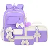 Nueva mochila transfronteriza para estudiantes de primaria, lindo conjunto de tres piezas con lazo, mochila escolar para niñas, gran capacidad, mochila reductora de peso