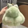 Llavero de Conejo Rex de Piel Genuina Lazo Lindo Conejo Llavero de Coche Adorable Conejo de Orejas Caídas Juguete de Peluche Colgante de Bolsa Conejo de Peluche