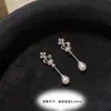 Unha de osso de orelha vermelha de amor única aço titânio furo de orelha pingente de pérola parafuso de fundo plano parafuso tampão de ouvido joia de unha de diabo