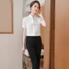 Camisa mujer sentido del diseño 2023 primavera y verano nueva moda top de gasa camisa profesional blanca manga corta