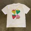 Camiseta de verano holgada de manga corta con estampado de fresas de seda de leche para hombre y mujer, top holgado de cuello redondo para parejas, estilo nuevo