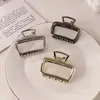 Pinza Cuadrada Hueca Transfronteriza Mediana Metálica Tipo Tiburón Versátil Elegante Pinza para el Cabello para la Parte Posterior de la Cabeza Horquilla Horquilla