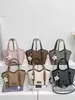 Bolso cubo de moda y sencillo para mujer, nuevo estilo coreano otoño 2026, alta estética, bolso de un solo hombro bajo el brazo