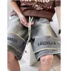 Shorts esportivos de rua estilo americano para atacado, para homens e mulheres, roupas de casal, shorts de verão de corte solto com fita tecida e letras estampadas, modernos