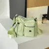 Bolsa de nylon da moda para mulheres 2026 novo modelo bolsa transversal ins bolsa de ombro casual bolsa de exterior moderna bolsa de mão de viagem