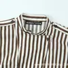 Comércio Exterior Transfronteiriço Roupas Femininas Primavera 2026 Nova Série de Moda Francesa Europeia e Americana Camisa Listrada Top 2088111