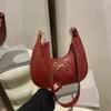 Bolsa de ombro com estampa de tecido Sweet Girl's Heart 2025, novo estilo, moda simples, estilo ocidental, com laço, bolsa de ombro de alta qualidade