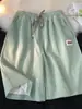 Novos Shorts Casuais de Seda de Gelo Secagem Rápida 2025 para Homens, Verão Finos Soltos Caimento Tendência Logo Bordado Retos Cinco Pontos