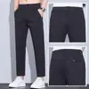 Calças casuais curtas masculinas de outono, calças cigarette versáteis de corte slim novo estilo, novas calças de 9 pontos de negócios 2026