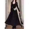Vestido Francés Talla Grande Negro Asimétrico de Alta Gama para Mujer en Otoño Cubriendo Vientre y Look Adelgazante Falda de Manga Larga