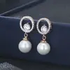 Temperamento dulce socialité Pendientes de perla fabricantes de pendientes venta al por mayor directa exclusiva transfronteriza para pendientes explosivos