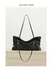 Nuevo producto 2026: diseño de nicho, bolso de hombro de cuero minimalista, bolso tote, bolso baguette moderno y casual para mujer