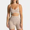 Soporta procesamiento OEM/ODM y personalización Conjunto deportivo de estampado de leopardo para mujer, sujetador y shorts, conjunto de ropa deportiva para exteriores y yoga