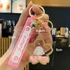 Liquidación de colección de llaveros colgantes de personajes de dibujos animados IP auténticos, lindos colgantes de estrella-luna-conejo para bolsos de niñas, stock para vendedores ambulantes