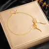 Elegante collar de corazón de doble capa, cadena de acero inoxidable chapada en oro de moda de nicho transfronterizo, cadena para la clavícula de lujo ligero para mujer