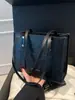 Bolso grande para mujer, bolso de mano de estilo popular de celebridades de Internet, bolso de hombro con textura, bolso de trabajo de gran capacidad para mujer, bolso de hombro con textura.