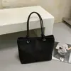 Bolso de Mano Tejido de Diseño de Nicho para Mujer 2026 Nueva Moda Versátil para el Trabajo Gran Capacidad Bolso de Mano Bolso de Hombro