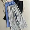 Design clássico xadrez, calça simples e de secagem rápida para homens, com corte relaxed e clean, estilo de perna reta e larga, e design casual versátil.