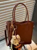 Bolso de Mano de Alta Gama Transfronterizo para Mujer Estilo Nuevo Otoño 2026 Moda Elegante Bolso Cubo de Hombro Cruzado