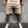Pantalones Deportivos Transfronterizos Estilo Europeo y Americano para Hombre Lisos para Correr y Entrenamiento Color Sólido Exportación Pantalones de Cinco Puntos