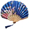 Directo de fábrica exquisito abanico de concha japonés abanico de cuchillo de dragón abanico de baile accesorios abanico abanico Hanfu abanico de cómic morado