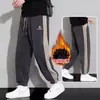 Pantalones deportivos de pana pesada Pantalones de chándal casuales para hombre Otoño/Invierno con forro polar Engrosados talla grande Pantalones color block holgados