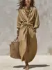 Vestido casual de punto con cuello de camisa de color liso para mujer, cruzado, de un solo botón, con bolsillo, manga larga, para Europa y América, 2026
