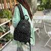 Mochila de lunares estilo coreano para estudiantes universitarias, elegante y ligera, adecuada para ir al trabajo, simple y versátil, ideal para viajes cortos