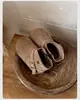 Botas de invierno para niñas, estilo nuevo, a la moda y retro, con suelas suaves, cálidas, ligeras y antideslizantes, adecuadas para condiciones de nieve