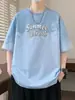 2026 Nuevo Estilo de Verano para Jóvenes Hombres Camiseta Casual con Cuello Redondo Elegante Holgada de Manga Corta con Color Degradado para Estudiantes de Secundaria y Preparatoria