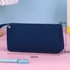Estojo Oxford simples, grande capacidade, resistente a manchas, estojo de papelaria simples, estojo elegante, presente de formatura para estudantes no início do ano letivo.