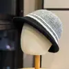 Sombrero de pescador de punto hueco de color sólido estilo coreano para mujer, otoño e invierno, ala ancha, transpirable, casual, protector solar, adecuado para ir de compras, versátil para el uso diario