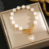 Moda Europeia e Americana Retrô Luz de Luxo Pérola Aço Titânio Colar Pulseira Diamante Pingente de Amor Fivela OT Joias de terno elegante