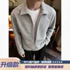 Chamarra tipo polo de otoño para hombre, estilo americano, ajuste holgado, falso dos piezas, cuello medio abierto, color gris